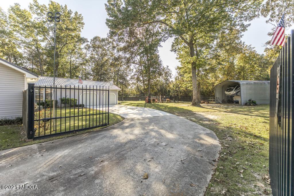 1471 Woolfolk Road Fort Valley, GA 31030 - Photo 45 of 51 a view of a outdoor space with a garden