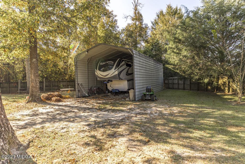 1471 Woolfolk Road Fort Valley, GA 31030 - Photo 49 of 51 a backyard of a house