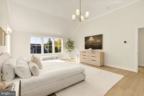 a bathroom with a double vanity sink mirror and shower