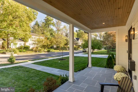 a view of yard with patio