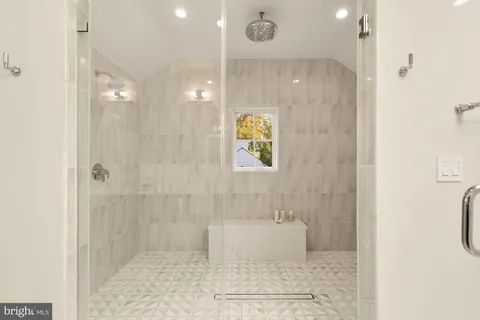 a view of closet area with empty racks