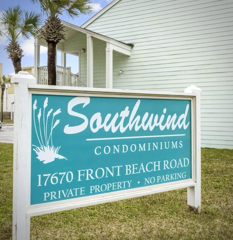 17670 Front Beach Road, Unit H9 Panama City Beach, FL 32413 - Photo 31 of 31 a sign that is on the side of a building
