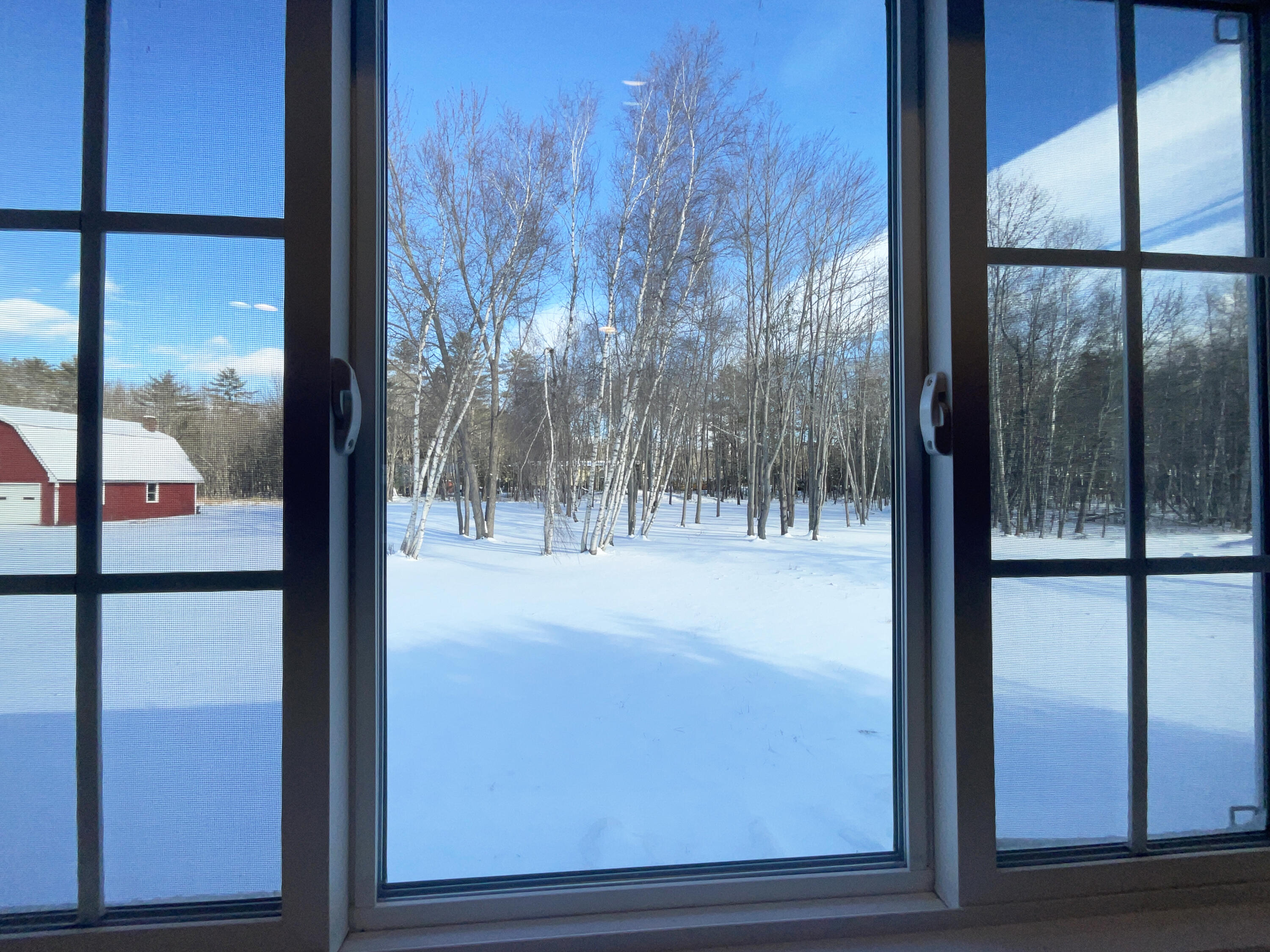 61 Water Street Howland, ME 04448 - Photo 3 of 24 Large KItchen window to back yard