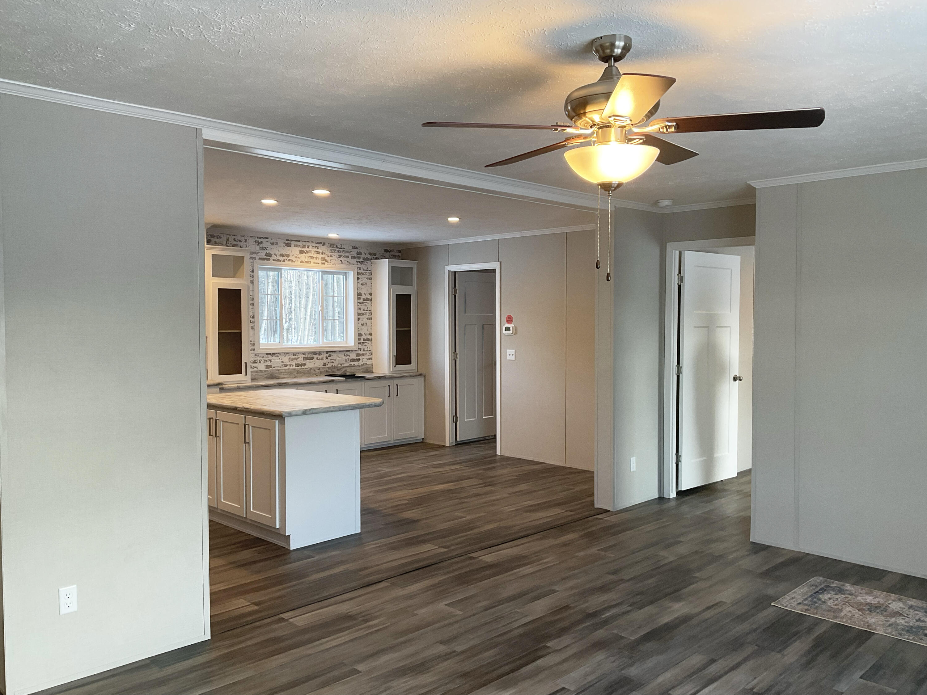 61 Water Street Howland, ME 04448 - Photo 6 of 24 Livingroom toward Kitchen