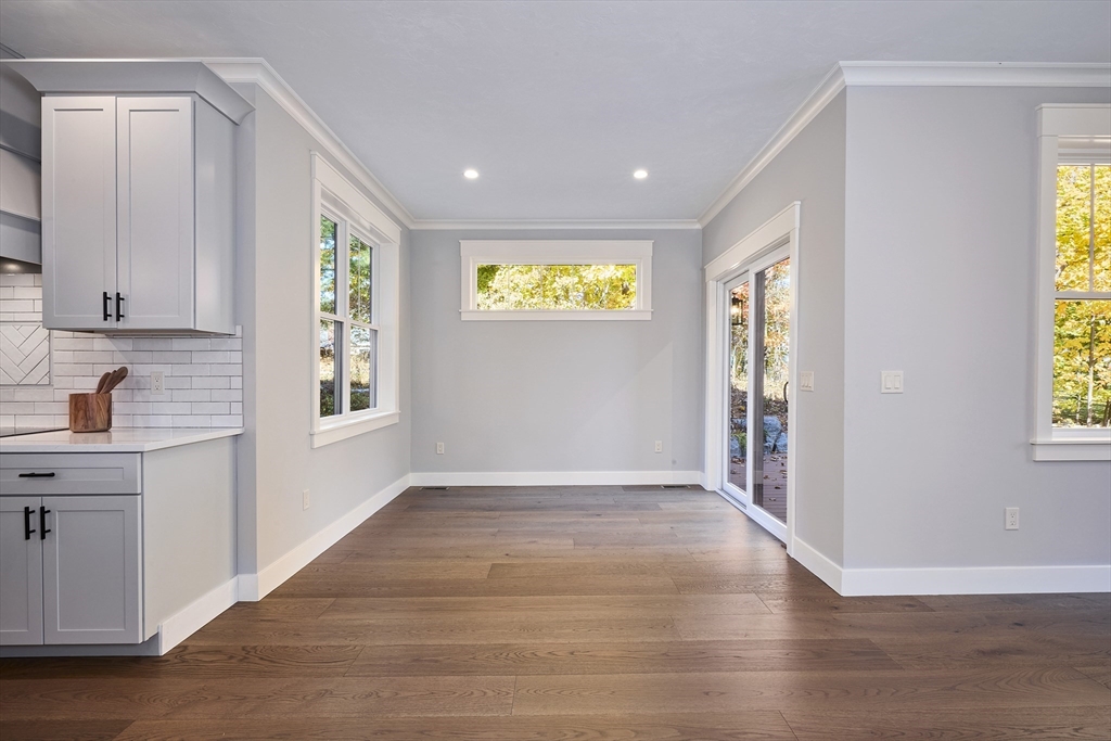 1 Thomas Drive Acton, MA 01720 - Photo 12 of 36 wooden floor in an empty room with a window
