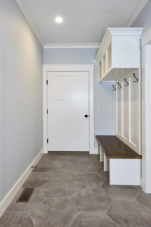 1 Thomas Drive Acton, MA 01720 - Photo 19 of 36 a view of an empty room with a glass door