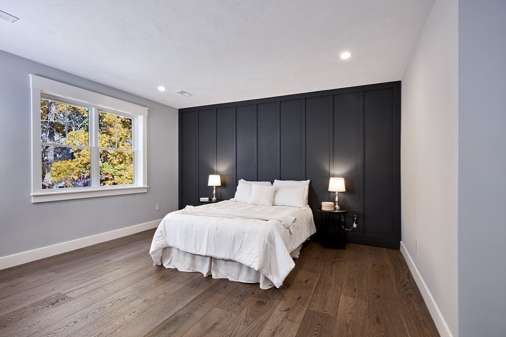 1 Thomas Drive Acton, MA 01720 - Photo 30 of 36 a bedroom with a bed and a window