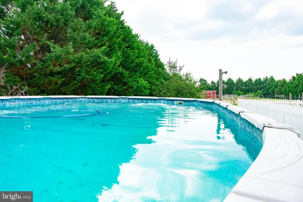 a view of a lake with a big yard