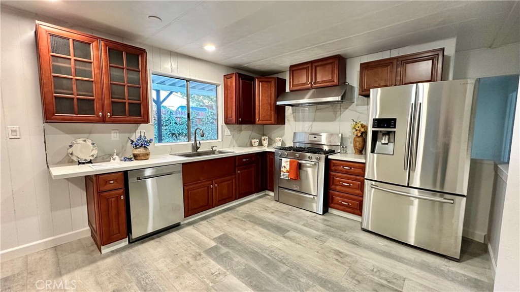 908 Louise Way Lebec, CA 93243 - Photo 1 of 32 Remodeled Kitchen, New Cabinets, Granite Counter Tops, Stainless Steel Sink, Nickle Faucet, Stainless Steel Appliances.