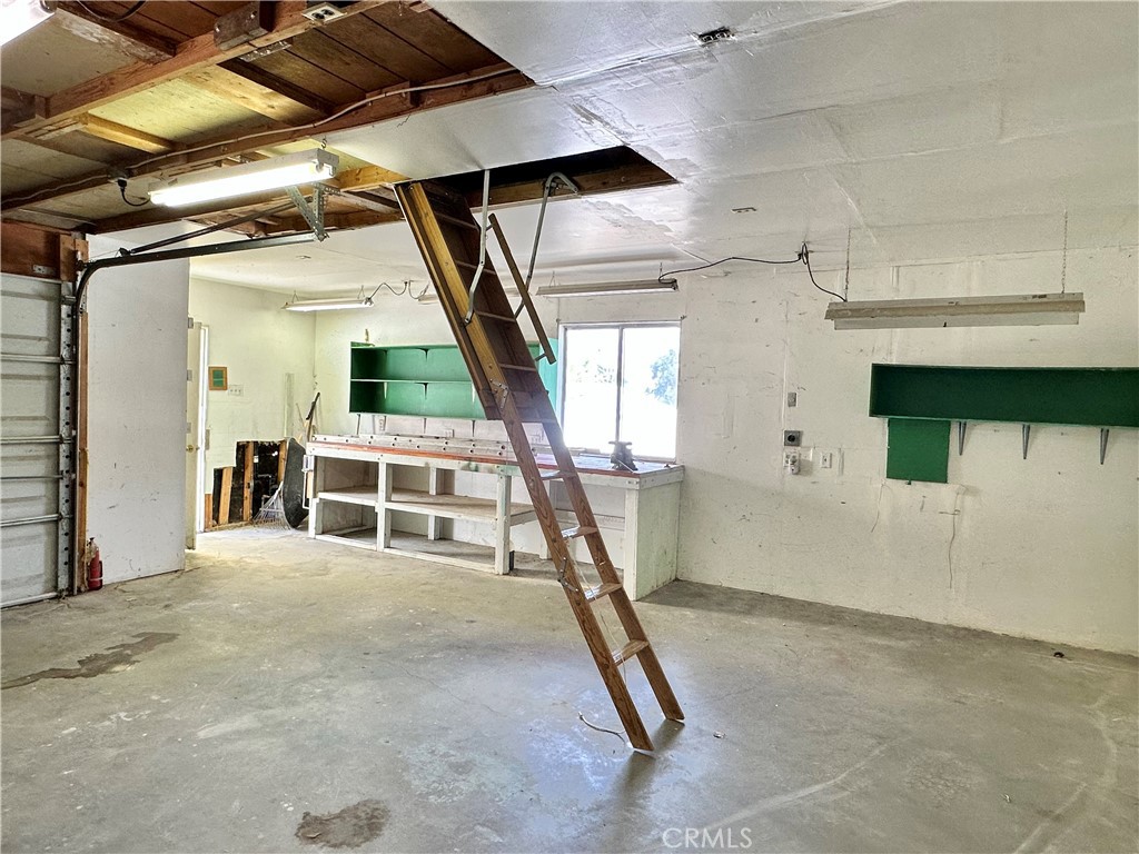 908 Louise Way Lebec, CA 93243 - Photo 22 of 32 Extra Storage above the garage.