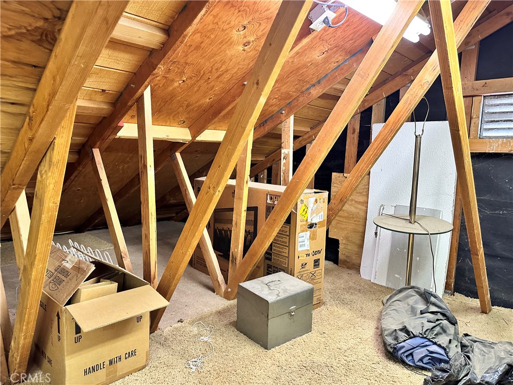 908 Louise Way Lebec, CA 93243 - Photo 23 of 32 Large lighted attic storage above 3 car garage.