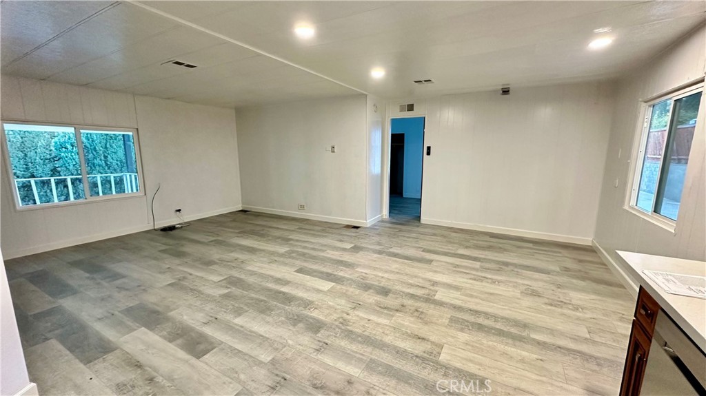 908 Louise Way Lebec, CA 93243 - Photo 5 of 32 New Laminate Flooring Thru Out and Upgraded Baseboards. Recessed LED Lighting.