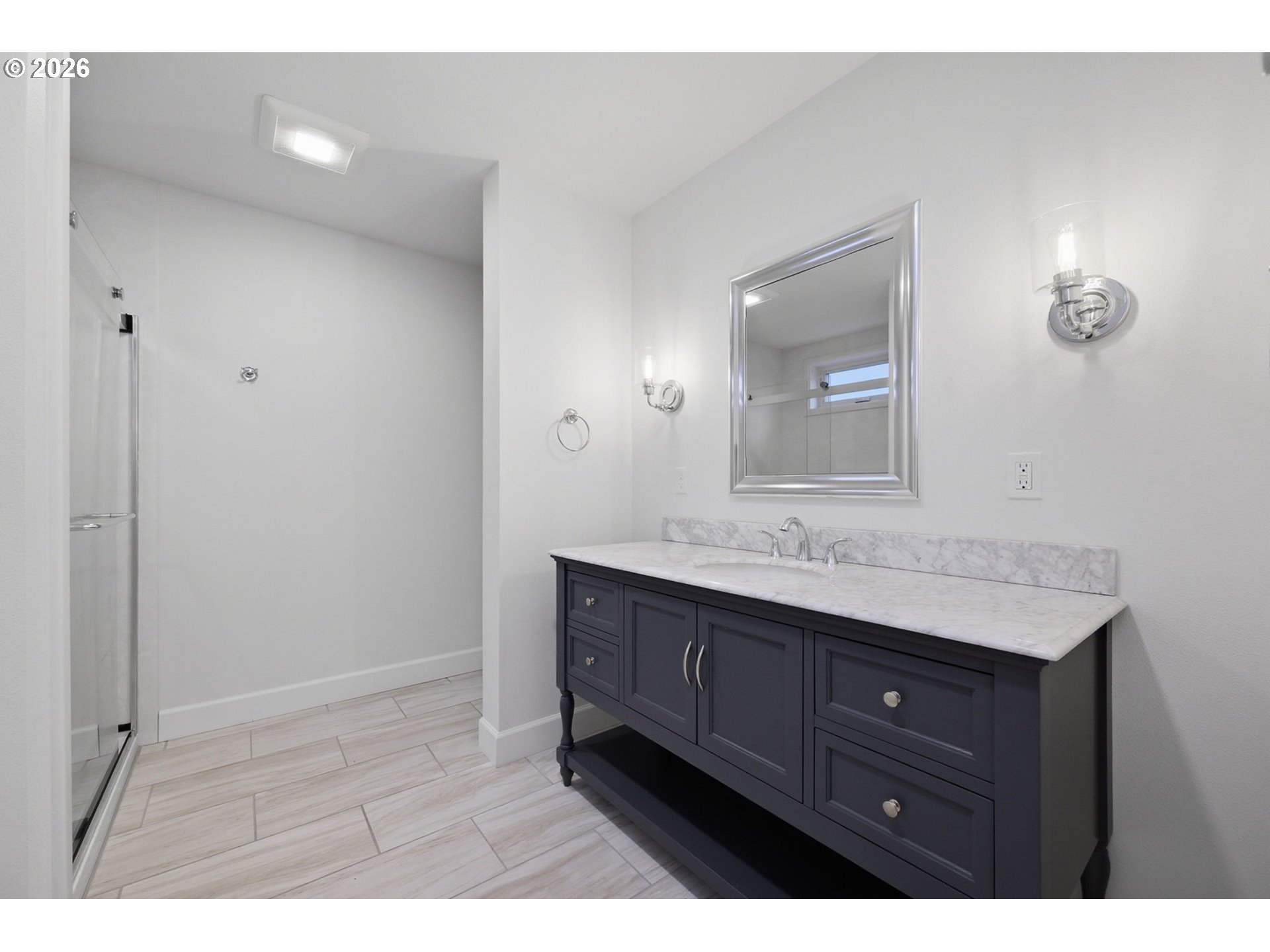 50 South 17th Street Cottage Grove, OR 97424 - Photo 15 of 24 a bathroom with a double vanity sink and mirror