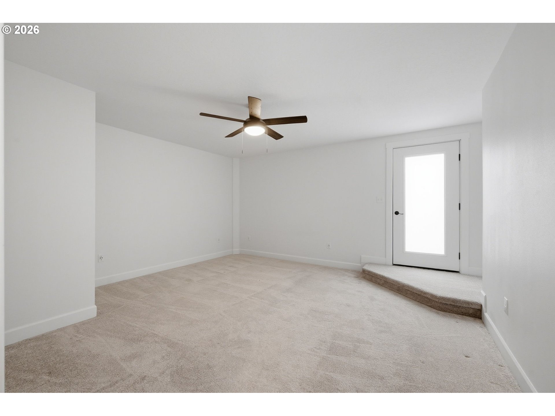 50 South 17th Street Cottage Grove, OR 97424 - Photo 16 of 24 a view of a livingroom with a ceiling fan and wooden floor