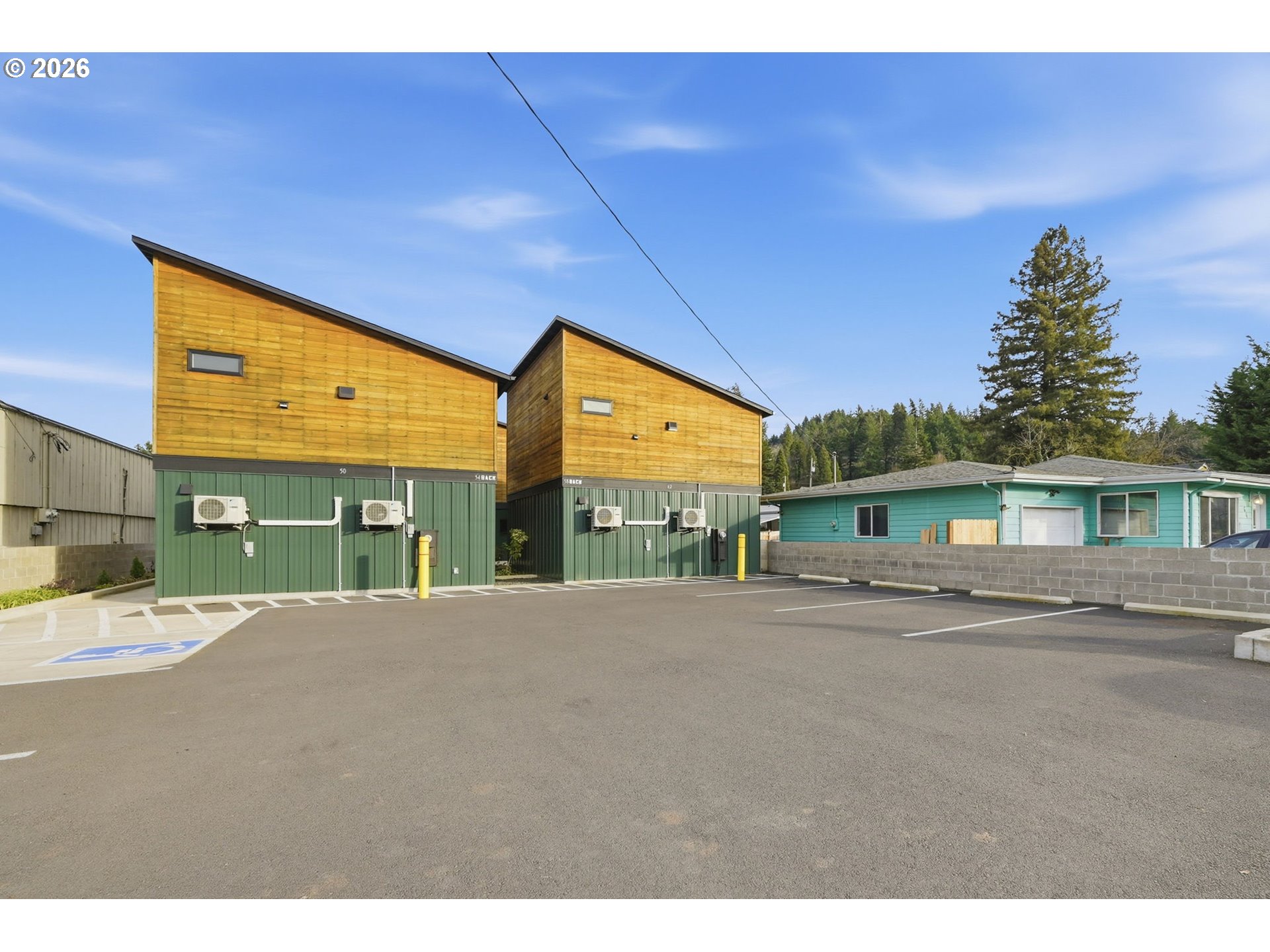 50 South 17th Street Cottage Grove, OR 97424 - Photo 4 of 24 a backyard of a house with table and chairs