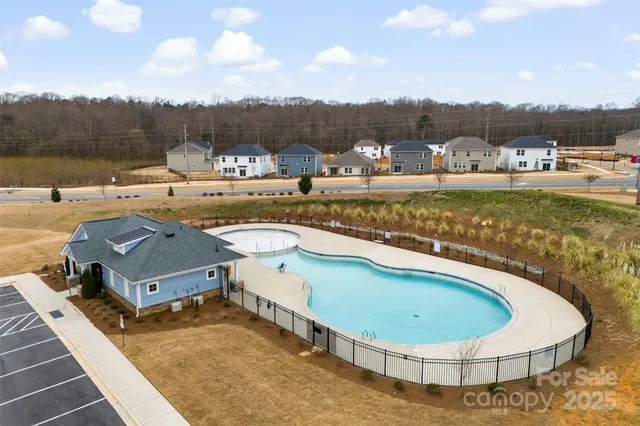 a view of a swimming pool and mountains