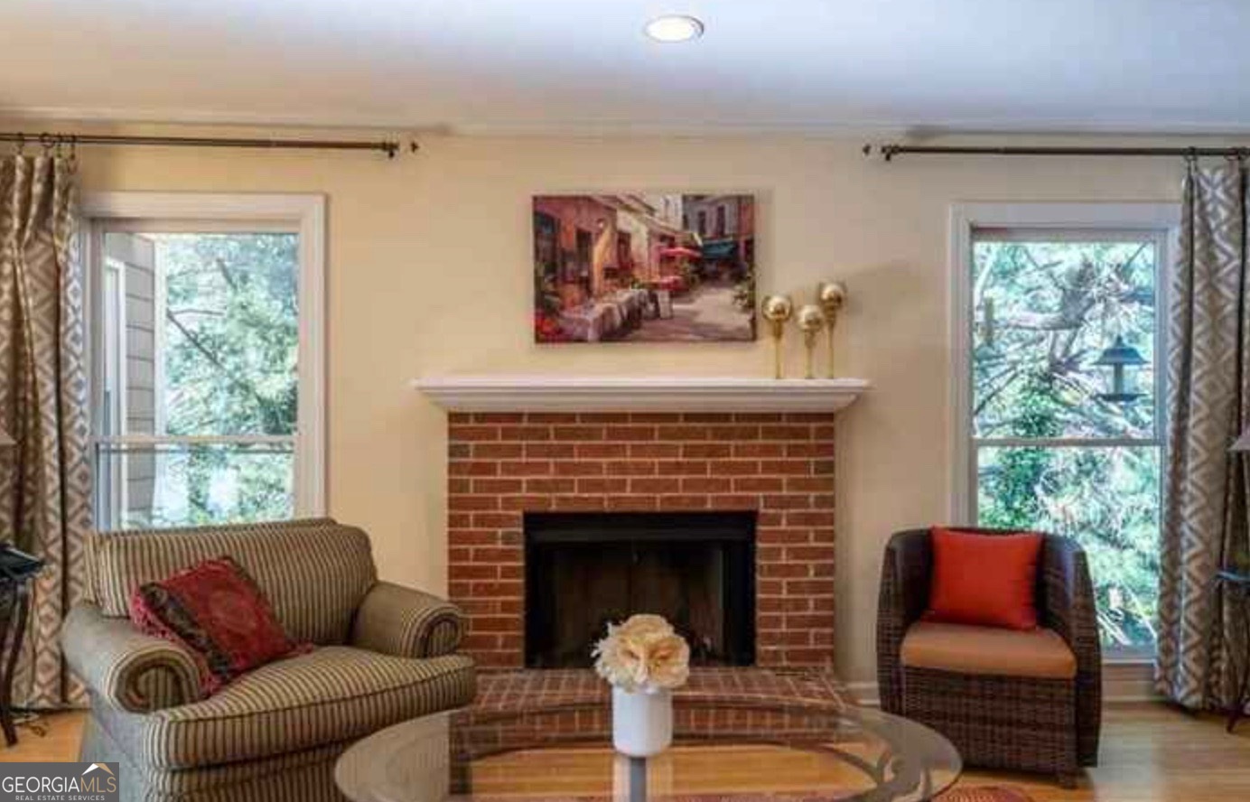 212 Abingdon Way Northeast Sandy Springs, GA 30328 - Photo 6 of 21 a living room with furniture fireplace and a large window