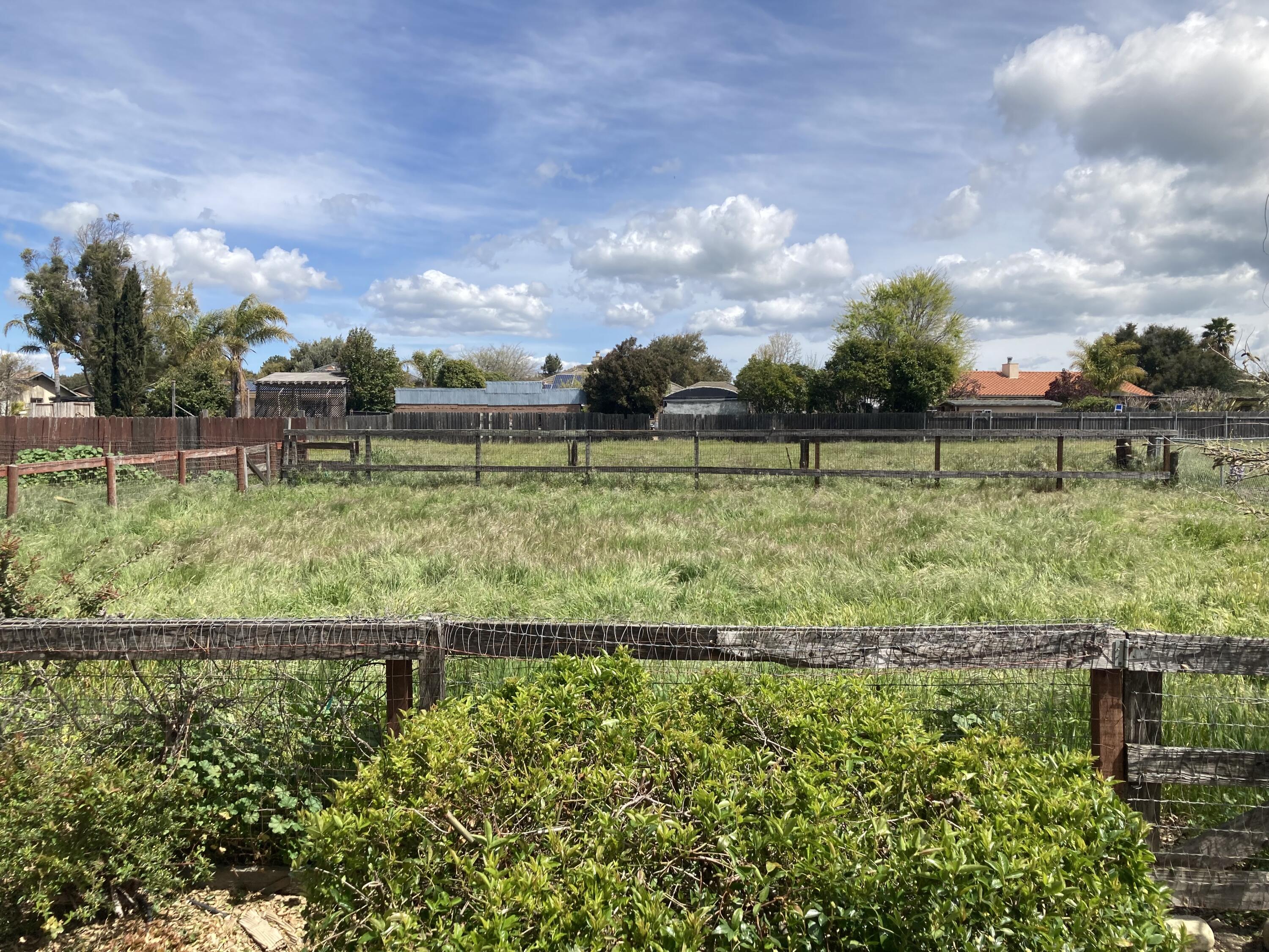490 Foxen Lane Los Alamos, CA 93440 - Photo 14 of 16 a view of a lake from a yard