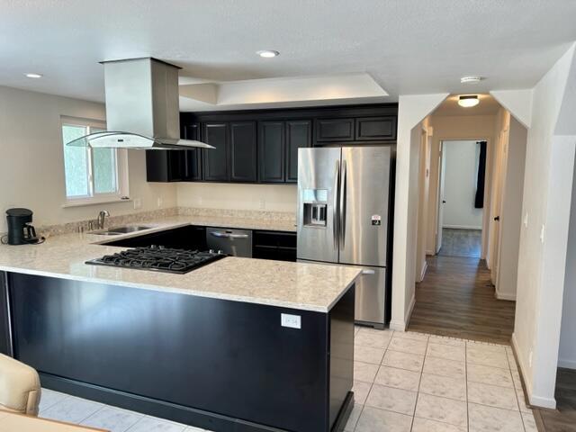 490 Foxen Lane Los Alamos, CA 93440 - Photo 7 of 16 a large kitchen with stainless steel appliances a large counter top a stove a sink a refrigerator and a refrigerator