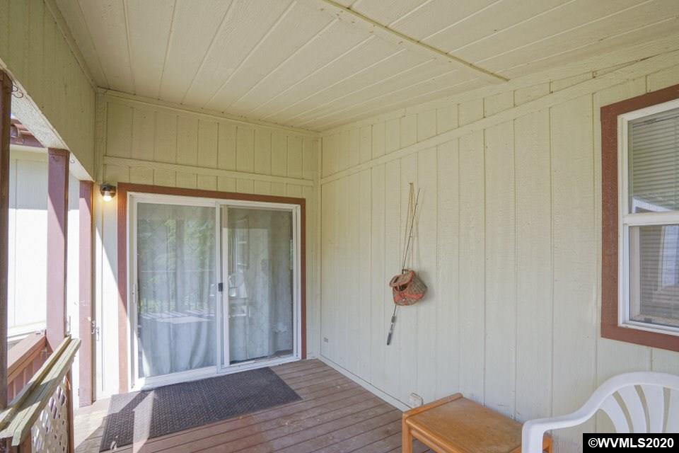 17265 Butler Hill Road Dallas, OR 97338 - Photo 35 of 38 a view of livingroom with hardwood floor and window