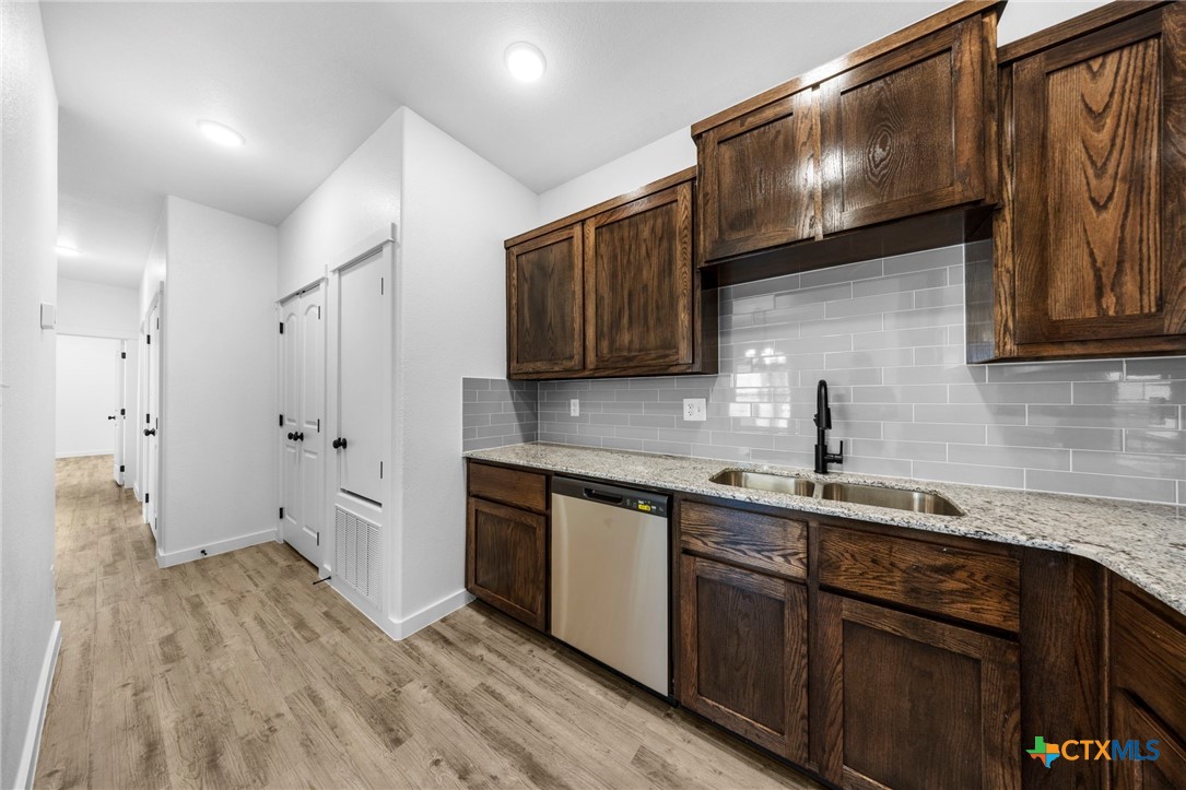 3604 Canvasback Road Killeen, TX 76542 - Photo 11 of 27 a kitchen with a sink and cabinets