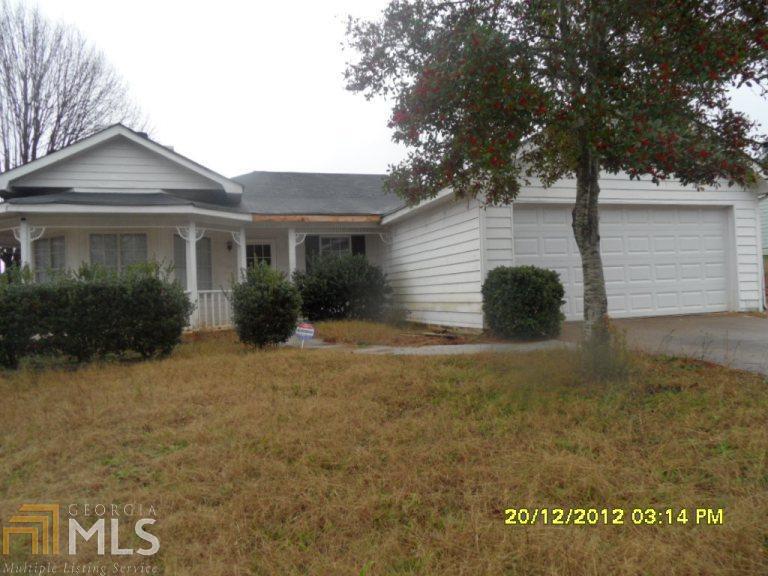 110 Dove Point Covington, GA 30016 - Photo 1 of 1 a view of a house with a yard