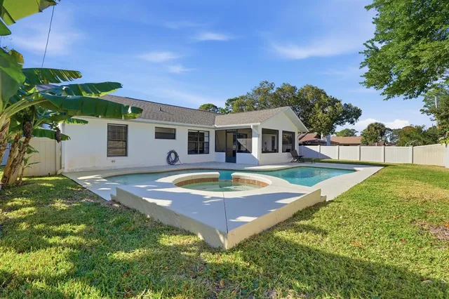 a view of a house with swimming pool