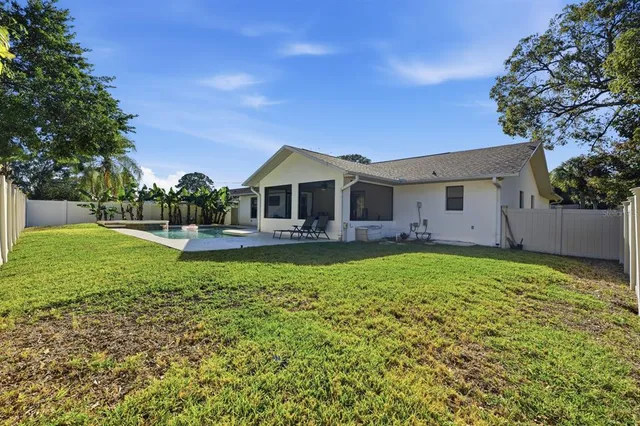a view of backyard with green space