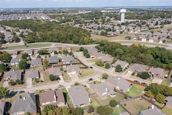 an aerial view of a city with lots of residential buildings