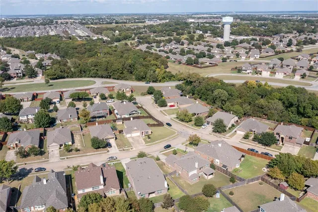 an aerial view of a city with lots of residential buildings