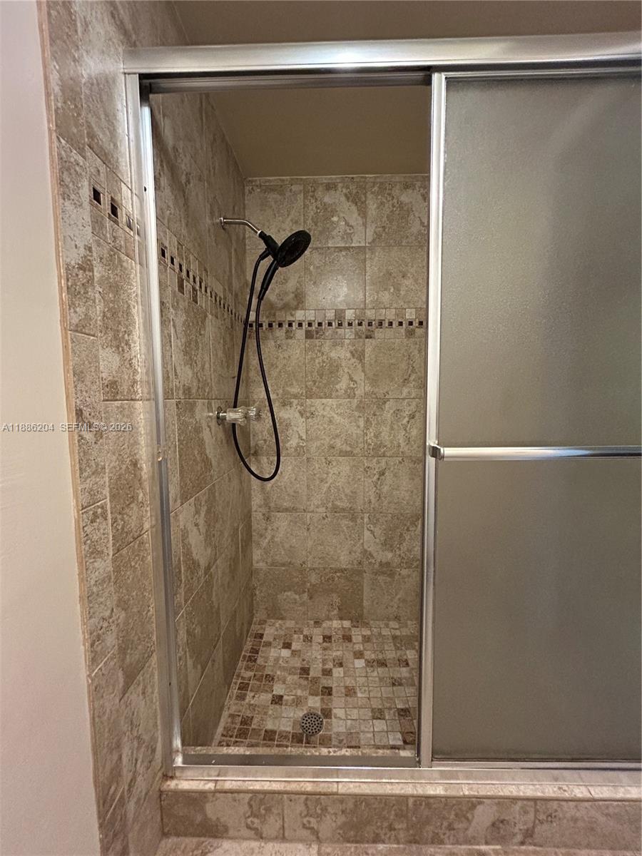 6520 Southwest 20th Street Plantation, FL 33317 - Photo 15 of 43 a bathroom with a shower