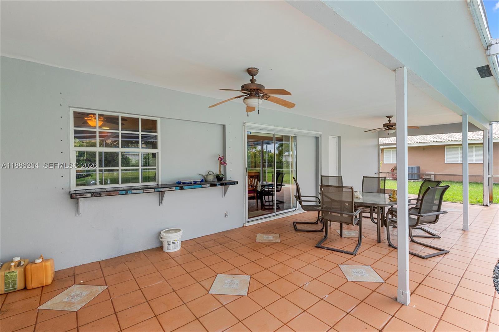 6520 Southwest 20th Street Plantation, FL 33317 - Photo 31 of 43 a dining room with furniture and window