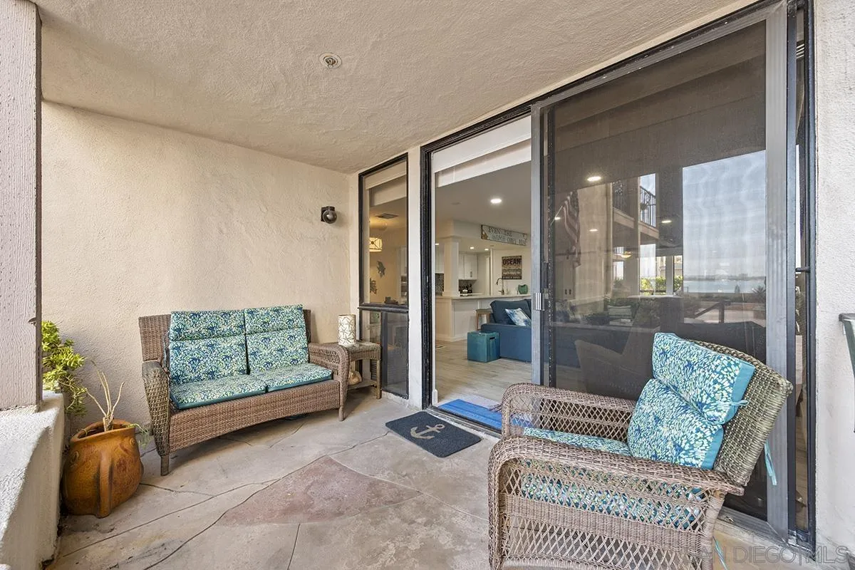1125 Pacific Beach Drive, Unit 104 San Diego, CA 92109 - Photo 30 of 67 a living room with furniture and a area