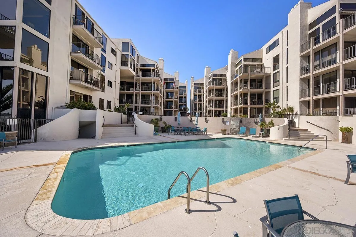 1125 Pacific Beach Drive, Unit 104 San Diego, CA 92109 - Photo 32 of 67 a view of building with outdoor space