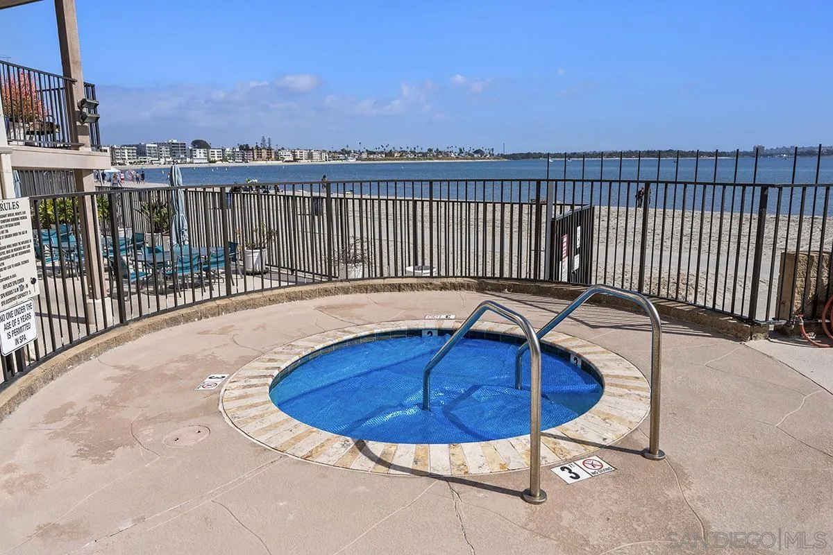 1125 Pacific Beach Drive, Unit 104 San Diego, CA 92109 - Photo 36 of 67 a view of a balcony with a table & chairs