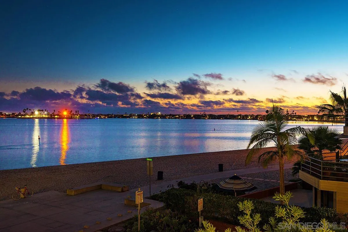 1125 Pacific Beach Drive, Unit 104 San Diego, CA 92109 - Photo 60 of 67 a view of a lake from a yard