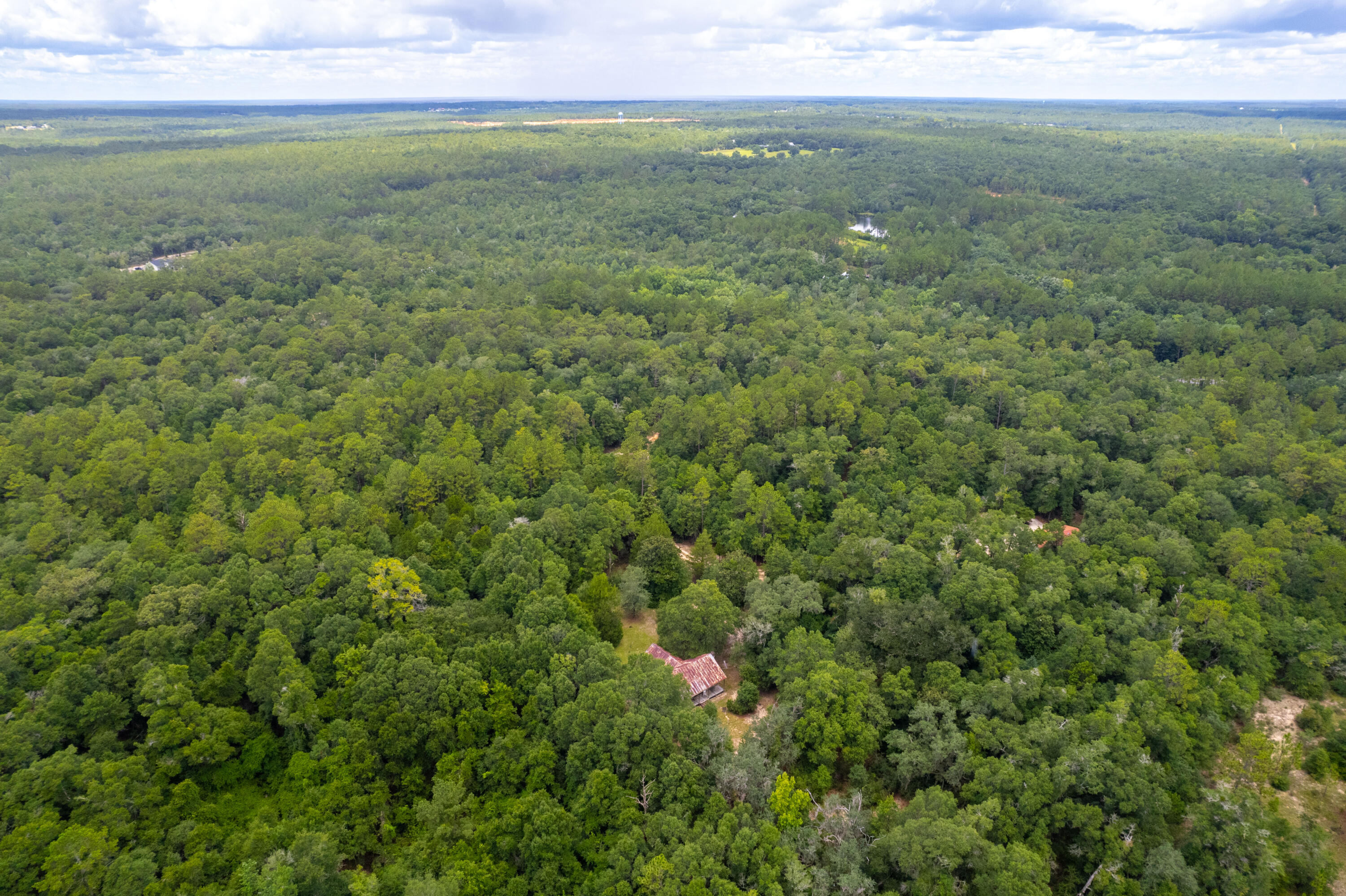 90 West Baker Baker, FL 32531 - Photo 2 of 8 a view of outdoor space and mountain view