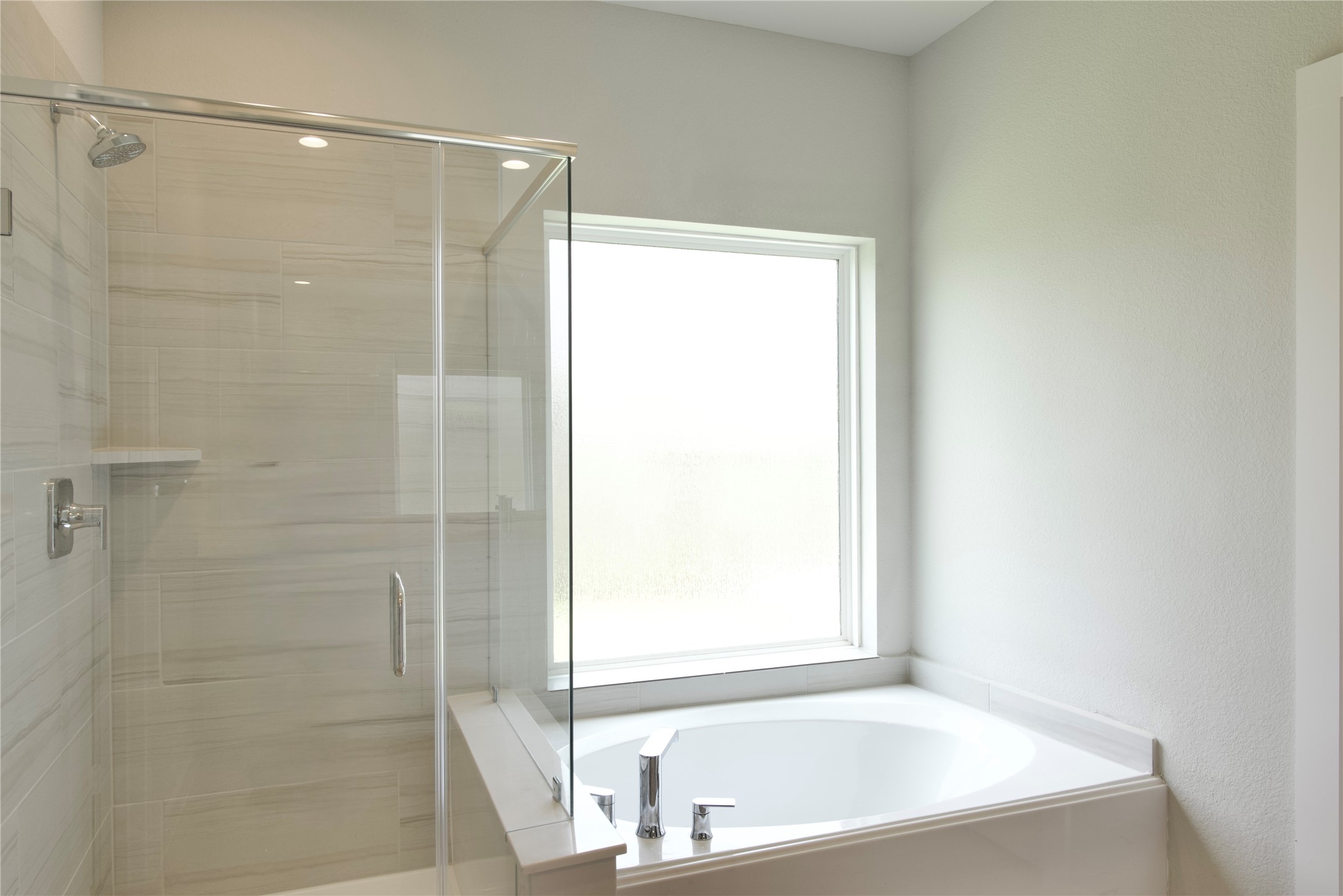 3207 Tilley Drive Rosenberg, TX 77471 - Photo 27 of 43 a bathroom with a bathtub and a shower