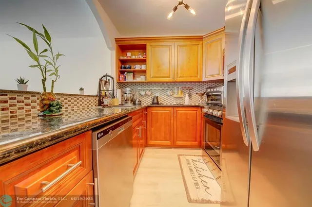 a kitchen with a sink and a window