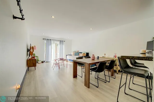 a bedroom with furniture and a gym equipment
