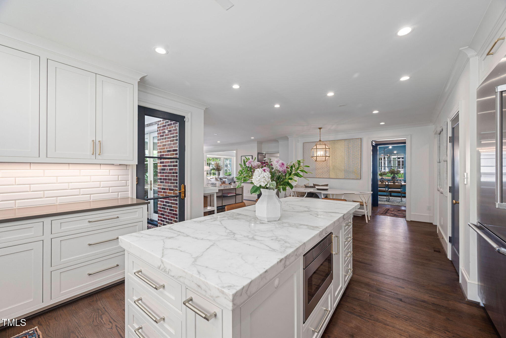 1619 Craig Street Raleigh, NC 27608 - Photo 16 of 49 a kitchen with sink stove and refrigerator