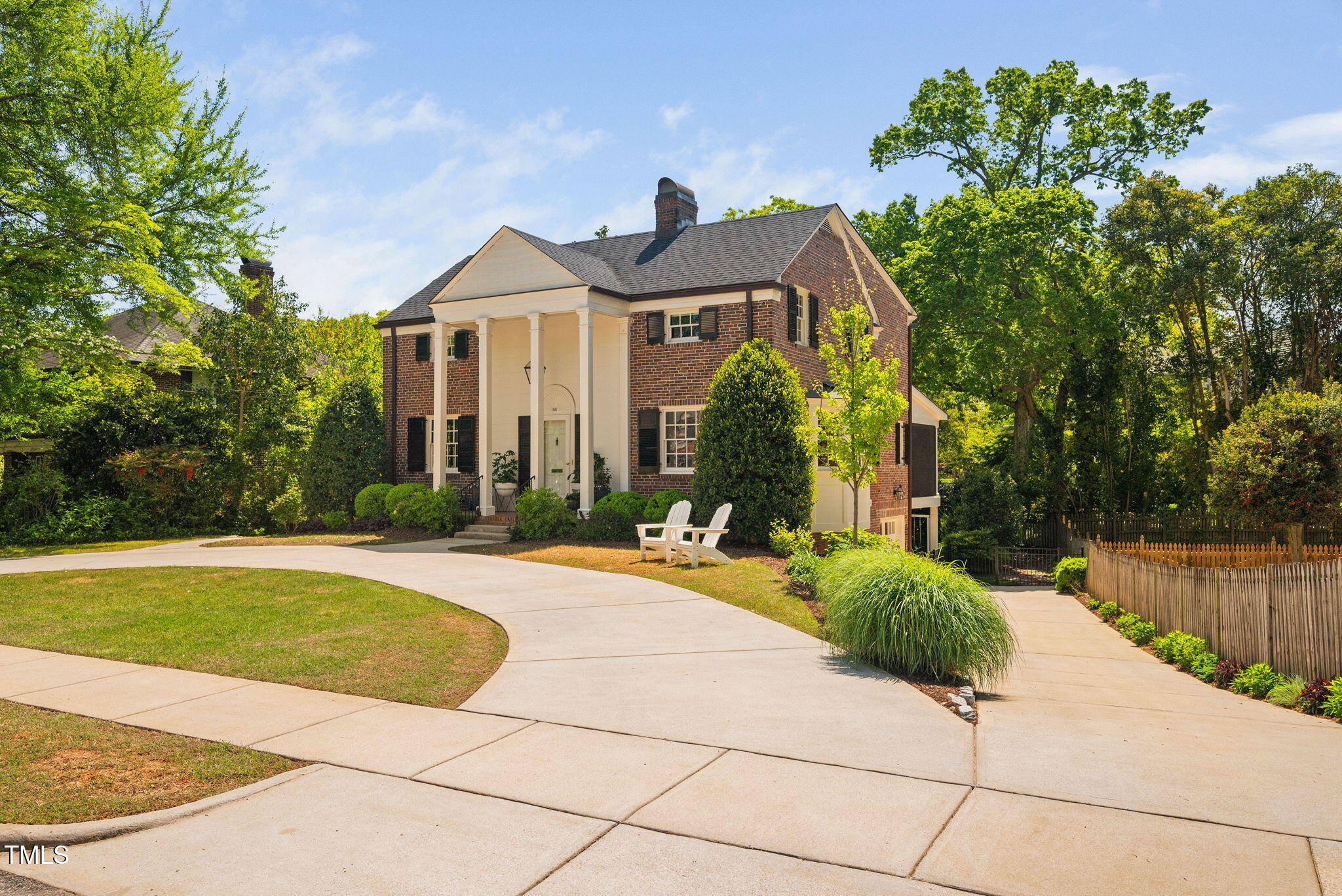 1619 Craig Street Raleigh, NC 27608 - Photo 2 of 49 a front view of a house with a yard and potted plants