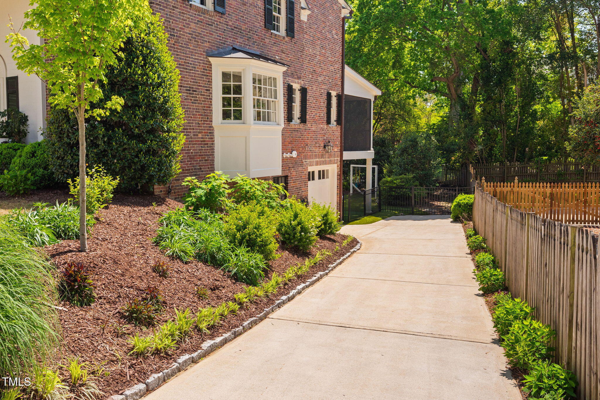 1619 Craig Street Raleigh, NC 27608 - Photo 4 of 49 a view of a pathway with a house