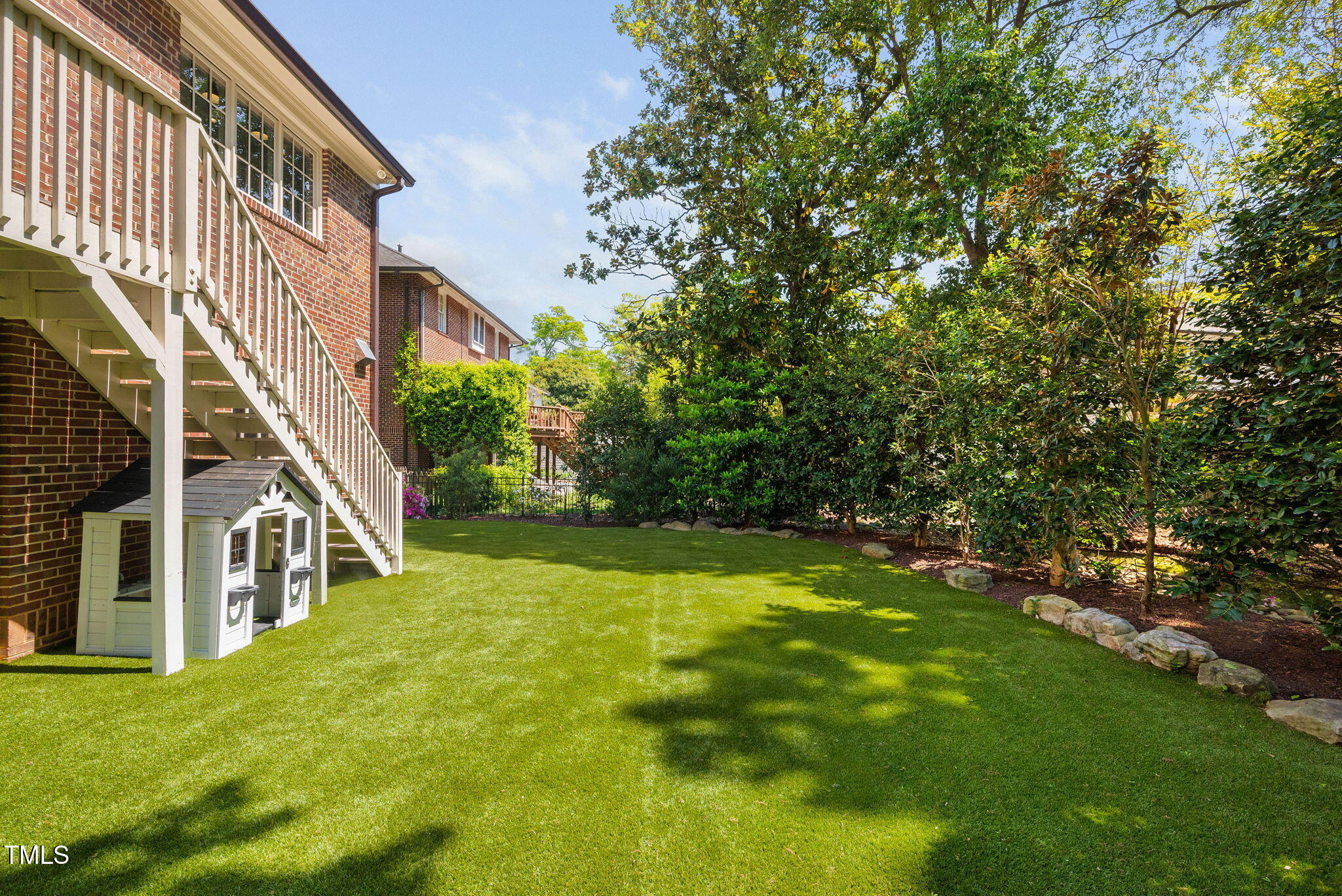 1619 Craig Street Raleigh, NC 27608 - Photo 44 of 49 a view of an house with backyard and garden