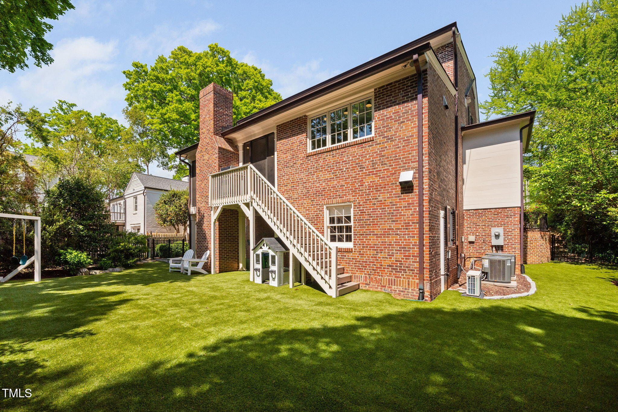 1619 Craig Street Raleigh, NC 27608 - Photo 45 of 49 a view of house with backyard
