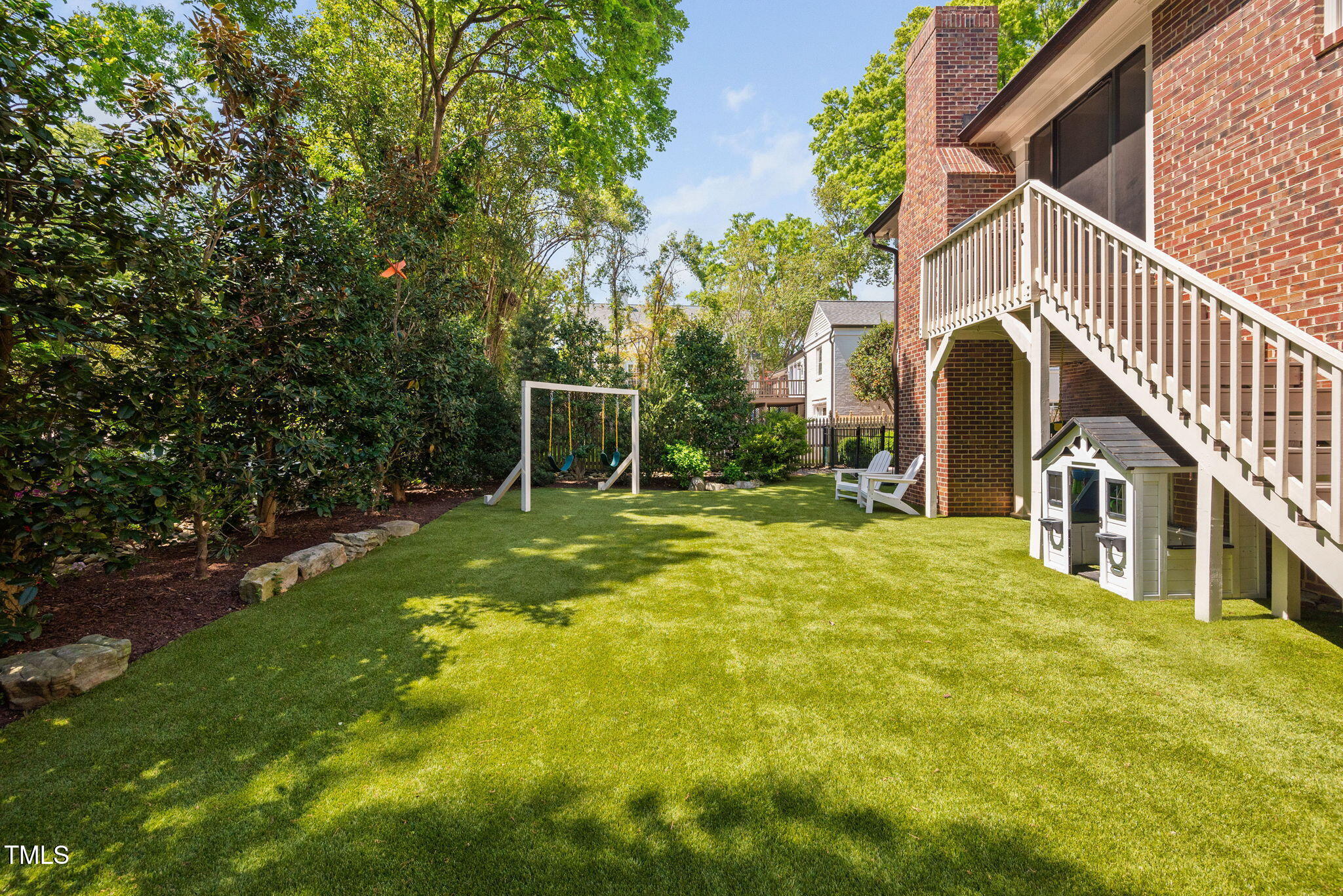 1619 Craig Street Raleigh, NC 27608 - Photo 47 of 49 a view of house with yard and seating area