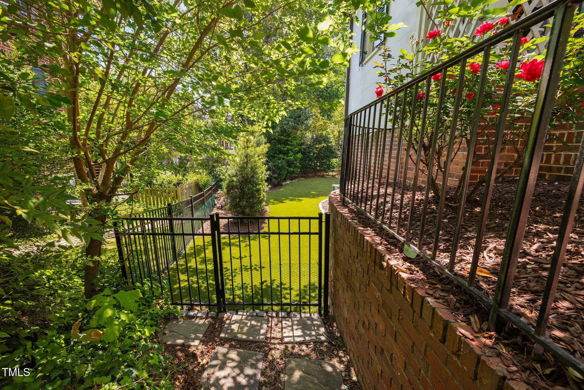 1619 Craig Street Raleigh, NC 27608 - Photo 49 of 49 a view of swimming pool from a garden