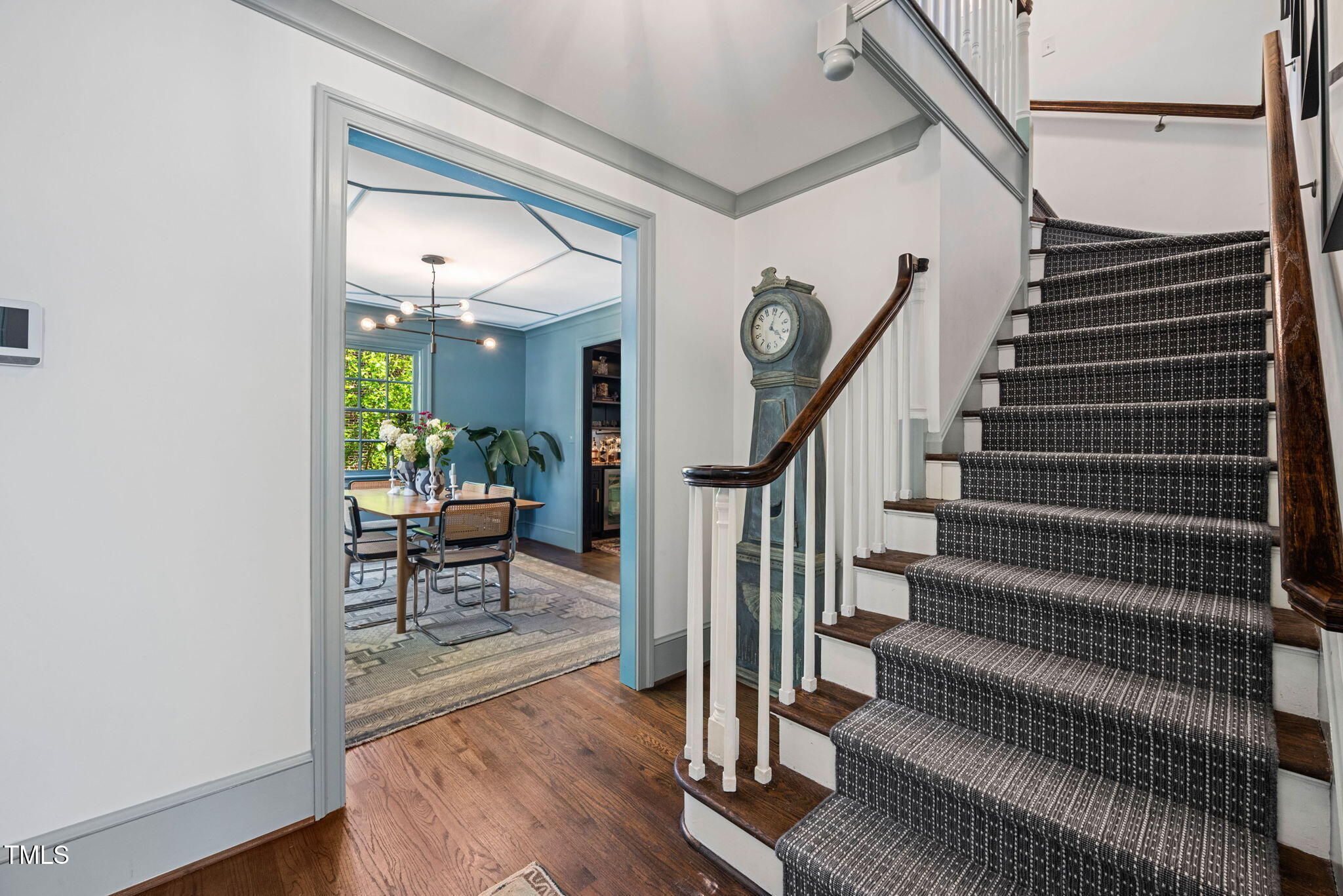1619 Craig Street Raleigh, NC 27608 - Photo 6 of 49 a view of entryway and hall with wooden floor