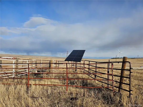 a view of swimming pool from a balcony