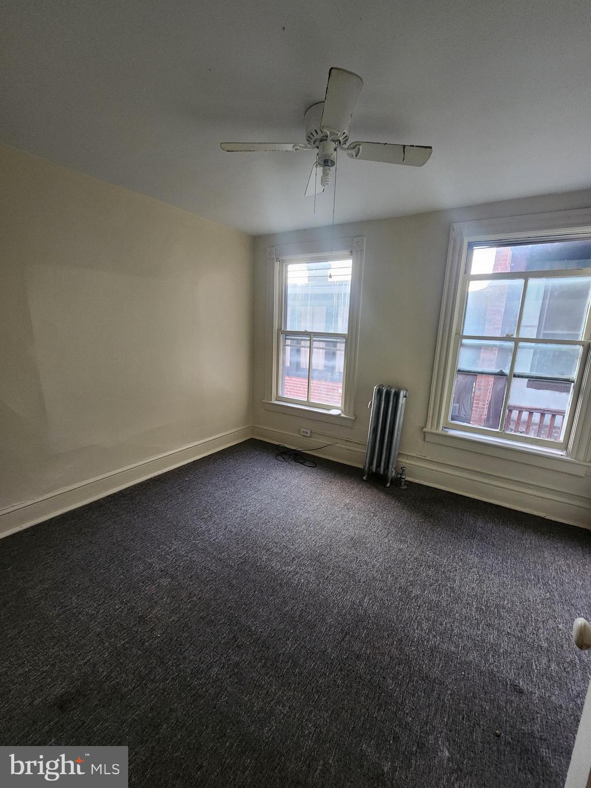 105 Park Street Cumberland, MD 21502 - Photo 12 of 18 a view of an empty room with a window